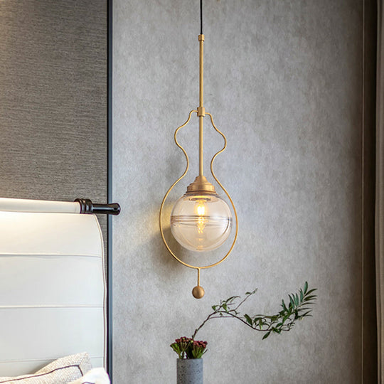 Postmodern 1-Light Clear Glass Ball Pendant Light with Ground Frame in Gold