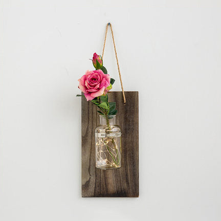 Modern Glass Jar Wall Sconce with Daisy/Rose Accents and Wood Backplate