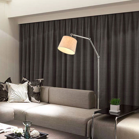 Contemporary LED Floor Lamp in Beige: Adjustable Arm, Tapered Design for Reading