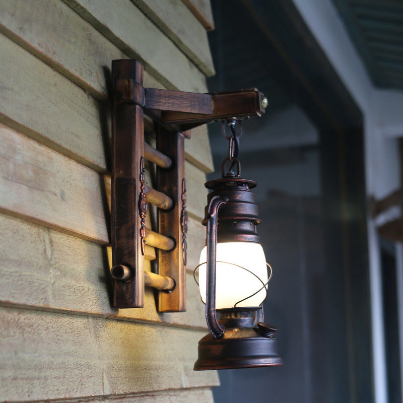 Vintage Clear Glass Wall Sconce with Antique Copper Cylinder, Cage, and Wooden Backplate - 1 Light Porch Lighting
