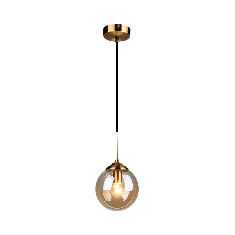 Sleek Brass Pendant Lamp with Amber/Smoke Glass Shade – Perfect for Dining Room Ceilings