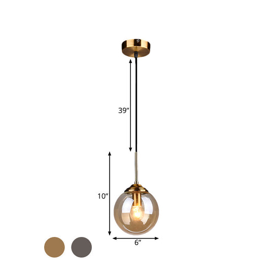 Sleek Brass Pendant Lamp with Amber/Smoke Glass Shade – Perfect for Dining Room Ceilings
