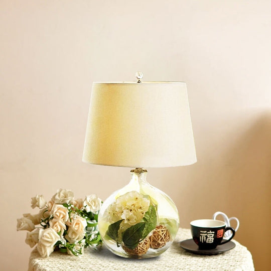 1-Light Fabric White Nightstand Lamp with Industrial Tapered Design and Floral Rattan Ball Decor