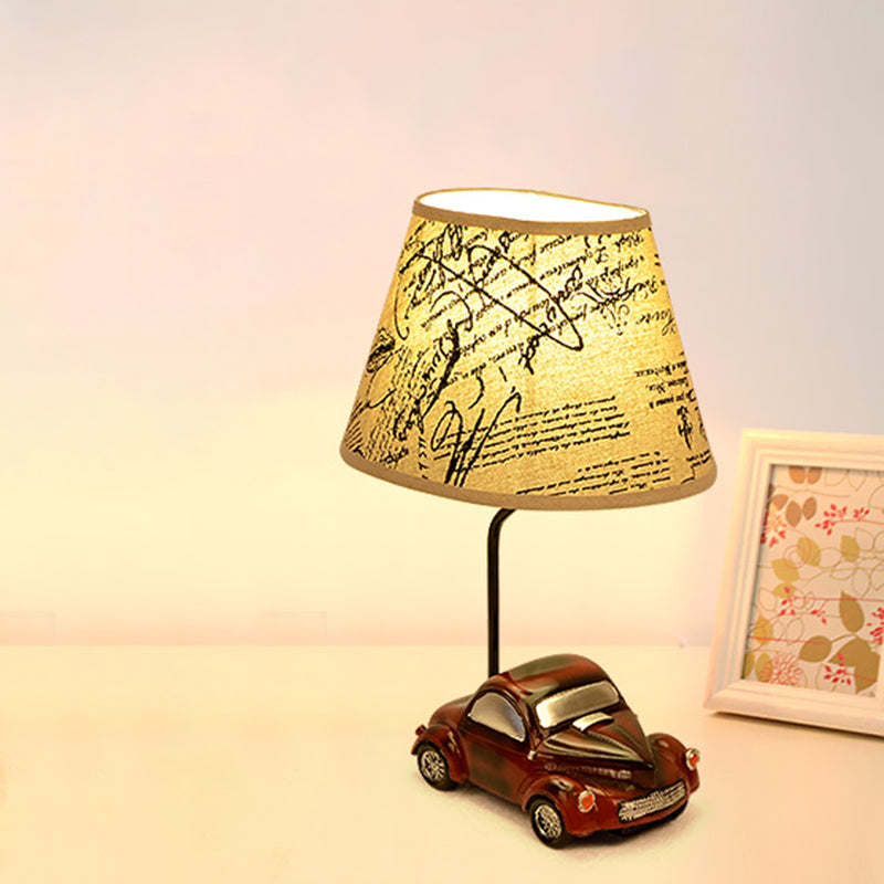 Kids Beige Barrel Night Table Lamp with Car Base - 1-Light Fabric Bedroom Nightstand Light