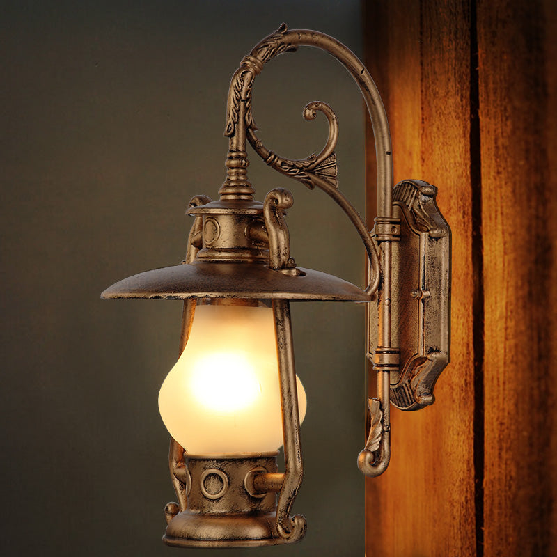 Frosted Glass Coastal Wall Mounted Lantern: Single Bulb Outdoor Sconce Light in Black/Aged Brass