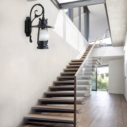 Frosted Glass Coastal Wall Mounted Lantern: Single Bulb Outdoor Sconce Light in Black/Aged Brass