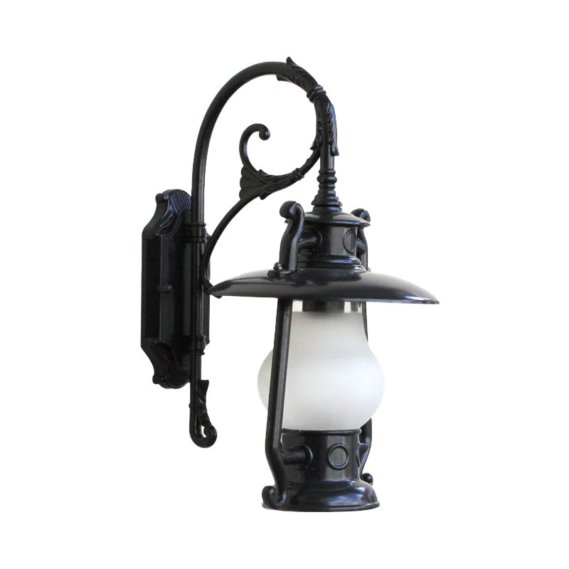 Frosted Glass Coastal Wall Mounted Lantern: Single Bulb Outdoor Sconce Light in Black/Aged Brass