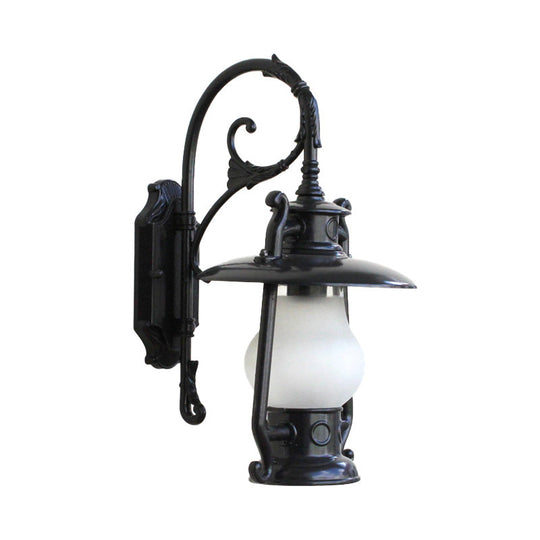 Frosted Glass Coastal Wall Mounted Lantern: Single Bulb Outdoor Sconce Light in Black/Aged Brass