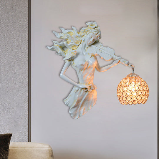 Antiqued Girl with Violin Wall Lamp: Single Bulb Resin Sconce with Clear Crystal Shade in White/Gold
