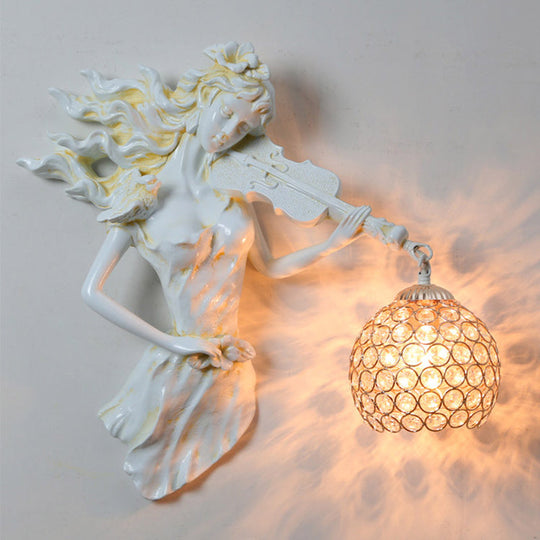 Antiqued Girl with Violin Wall Lamp: Single Bulb Resin Sconce with Clear Crystal Shade in White/Gold