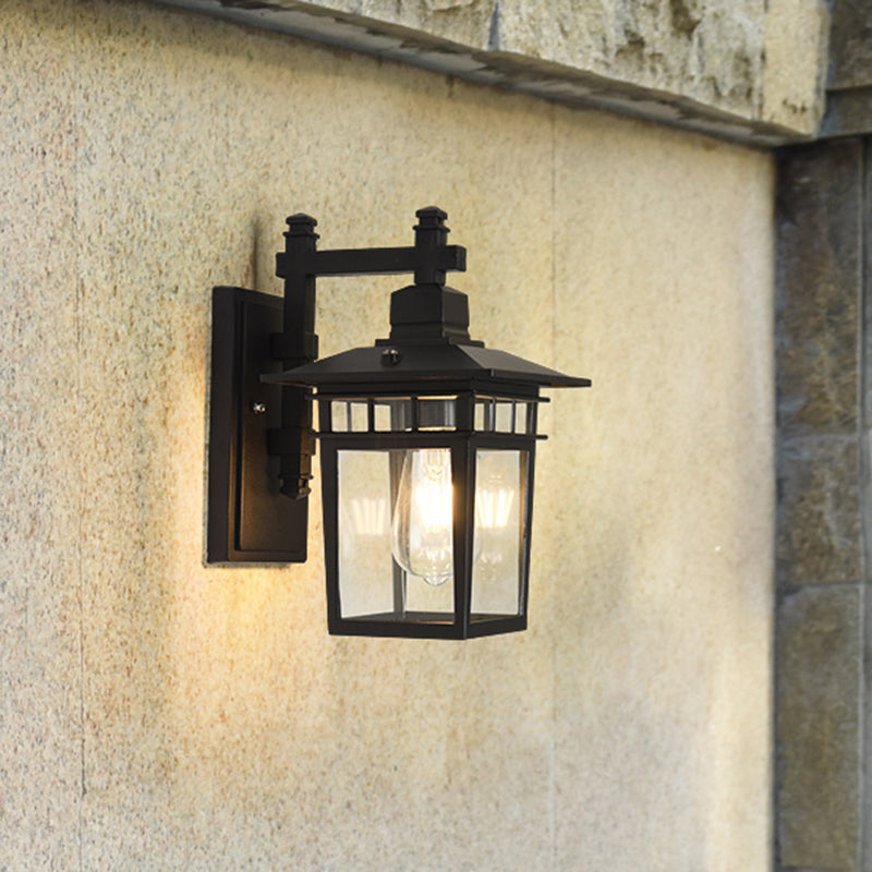 Industrial Outdoor Wall Lamp: Pavilion Clear Glass Wall Mounted Light in Black - 1-Bulb