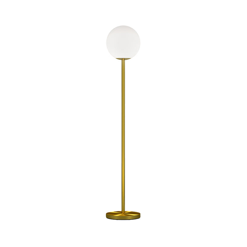 Contemporary Milky Glass Sphere Floor Light with Brass Finish - Ideal for Bedroom Reading
