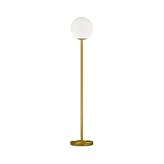 Contemporary Milky Glass Sphere Floor Light with Brass Finish - Ideal for Bedroom Reading