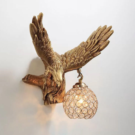 Rustic Resin Eagle Wall Sconce: Gold Single Head with Orb K9 Crystal