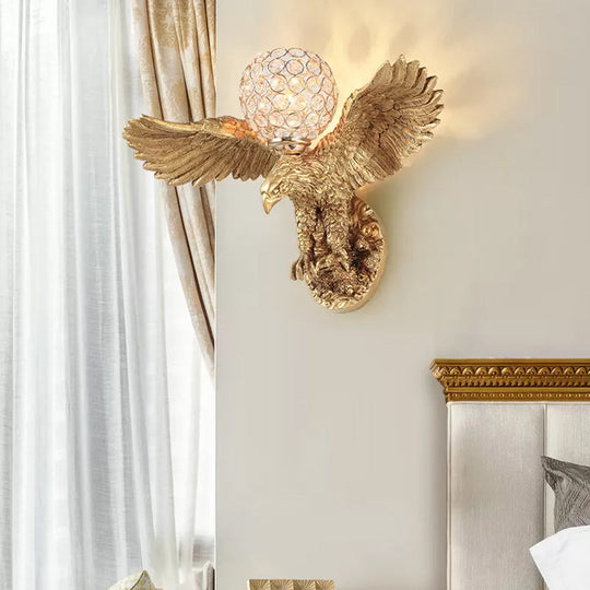Rustic Resin Eagle Wall Sconce: Gold Single Head with Orb K9 Crystal