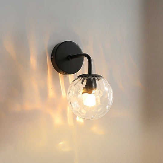 Minimalist Glass Ball Wall Lamp with Ripple Effect and Bent Arm in Black/Gold - Ideal for Bedroom Lighting