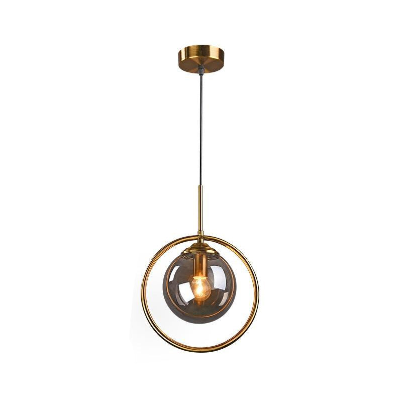 Postmodern Glass Pendant Light with Brass Ring for Bedroom - Single-Bulb Globe Down Lighting in Clear, Amber, and Smoke Grey