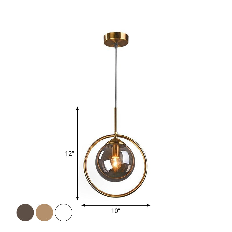 Postmodern Glass Pendant Light with Brass Ring for Bedroom - Single-Bulb Globe Down Lighting in Clear, Amber, and Smoke Grey