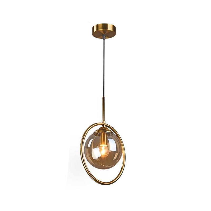 Postmodern Glass Pendant Light with Brass Ring for Bedroom - Single-Bulb Globe Down Lighting in Clear, Amber, and Smoke Grey