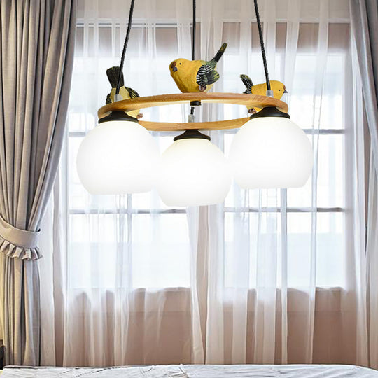 Yellow Bird Globe Chandelier: Modern Design Glass Shade for Living Room Lighting