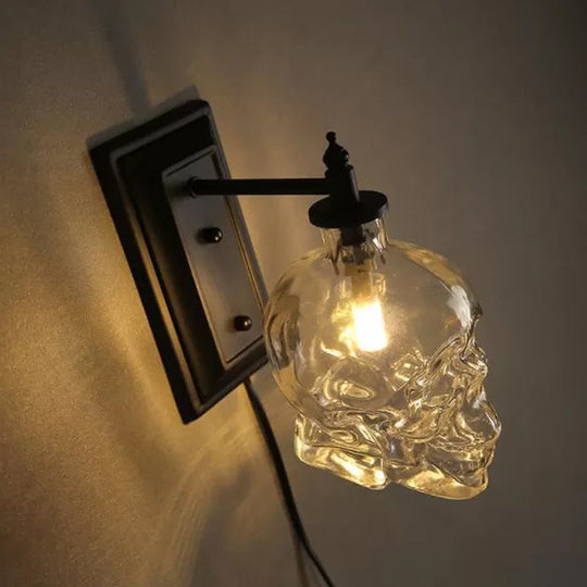 Skull Sconce Lamp - Clear Glass Decorative Wall Mounted Lighting Fixture with 1-Light in Black