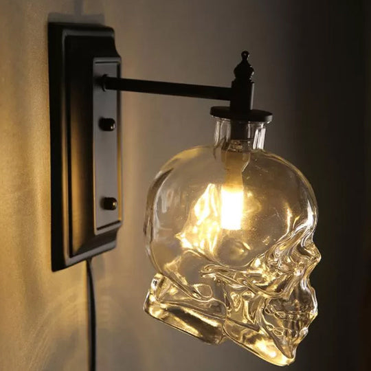 Skull Sconce Lamp - Clear Glass Decorative Wall Mounted Lighting Fixture with 1-Light in Black