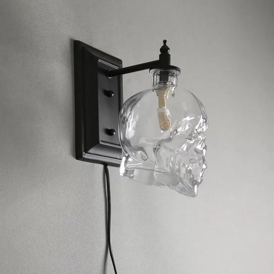 Skull Sconce Lamp - Clear Glass Decorative Wall Mounted Lighting Fixture with 1-Light in Black