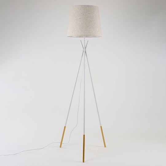 Minimalist Black/White Tapered Floor Lamp with Brass Accents