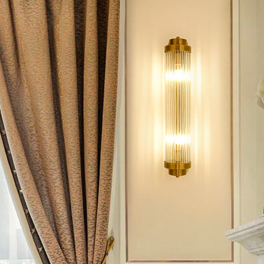 Postmodern Gold Wall Sconce with Clear Fluted Glass - 2 Lights, Tubular Design