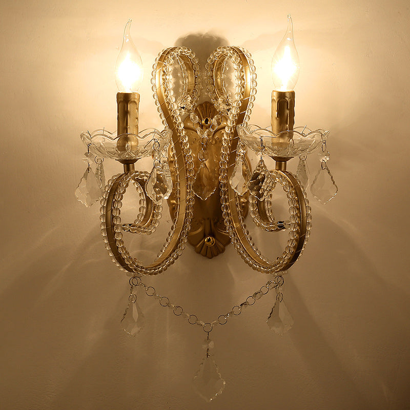 Brass Scrolled Arm Wall Lighting with Dropping Crystals - Traditional Metal Wall Mount Fixture