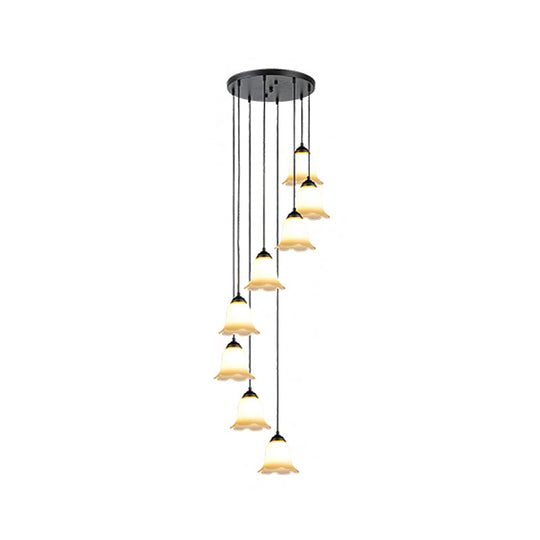 Minimalist Black Flower Stairs Pendant Light with Frosted Glass and Round Canopy