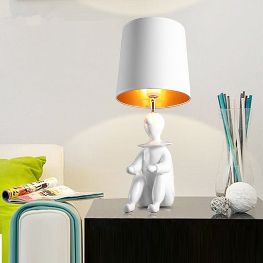 Modern Desk Lamp with Metal Cylinder Design and Sitting Boy, Ideal for Kids' Bedroom