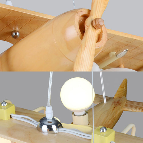 Nordic Beige Wood Pendant Light: Glider Shaped Hanging Light for Kindergarten