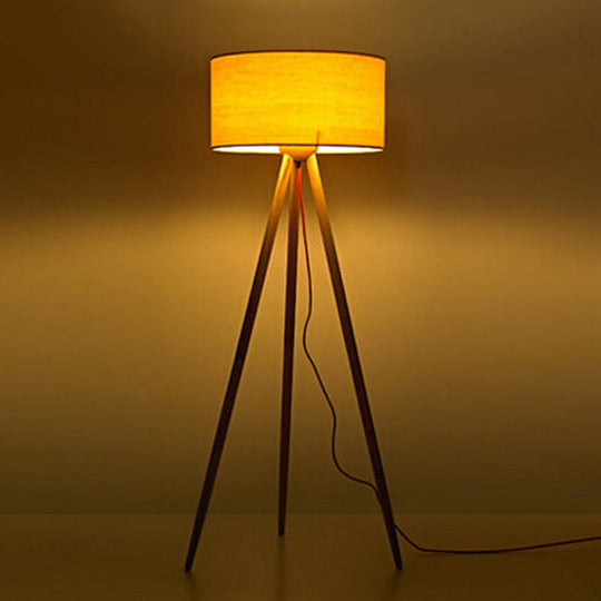 Simple wooden LED floor lamp with cylinder shade, ideal for bedroom - Beige