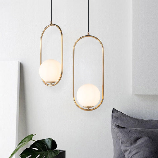 Modern Opal Glass Globe Pendant Light with Gold Finish and Oval Frame