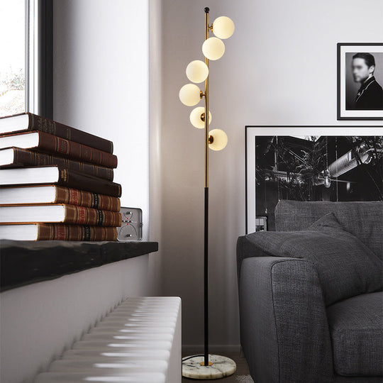 Minimalist Spiral Design - Gold and Black Ball Floor Lamp with 6-Bulb Cream Glass
