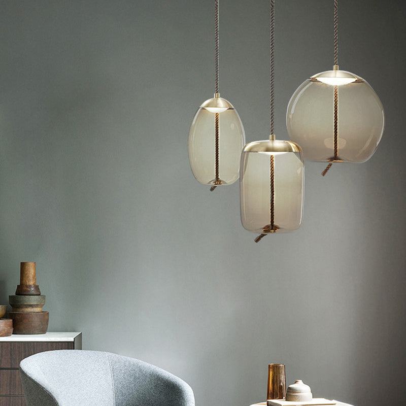 Contemporary Amber Glass Suspension Lamp - Stylish Pendant Lighting Fixture for Dining Room