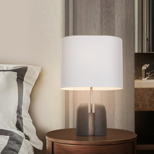 Modern Resin Base Nightstand Lamp: Bucket-Shaped Table Light with Fabric Shade in Contemporary Black Design