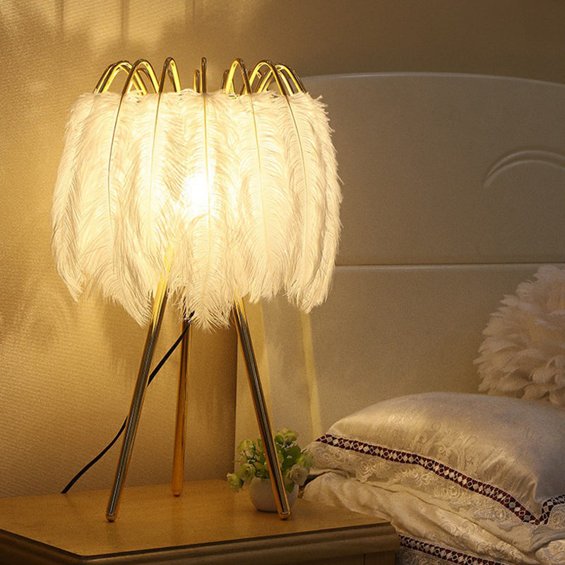 Minimalistic Metallic Tripod Table Light with Feather Shade in Gold