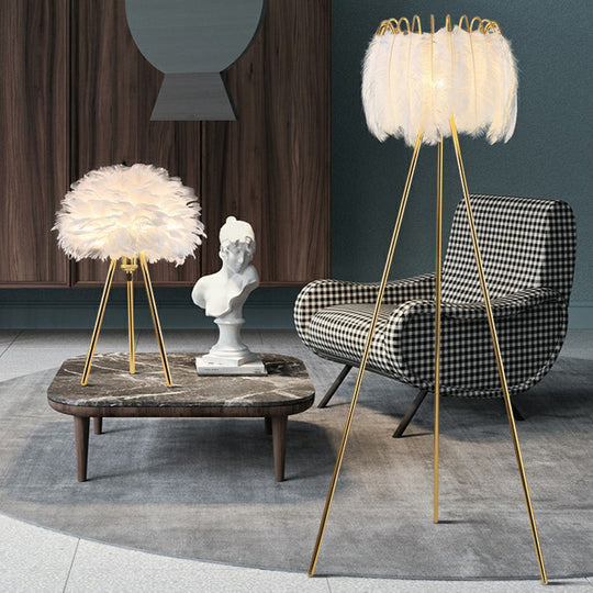 Minimalistic Metallic Tripod Table Light with Feather Shade in Gold