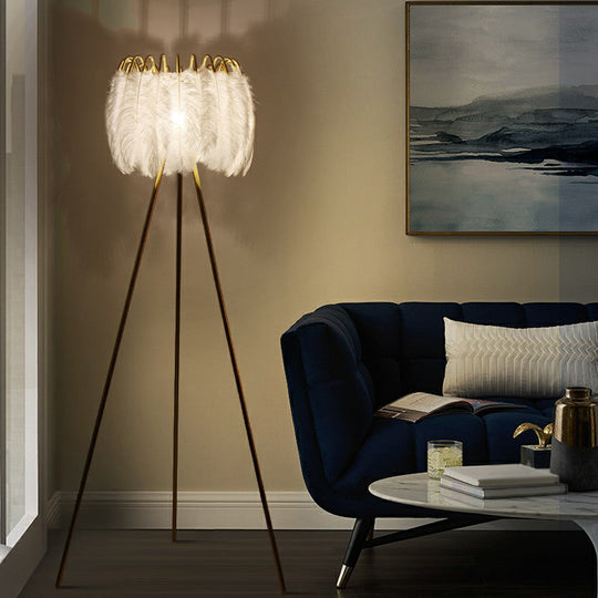 Minimalistic Metallic Tripod Table Light with Feather Shade in Gold