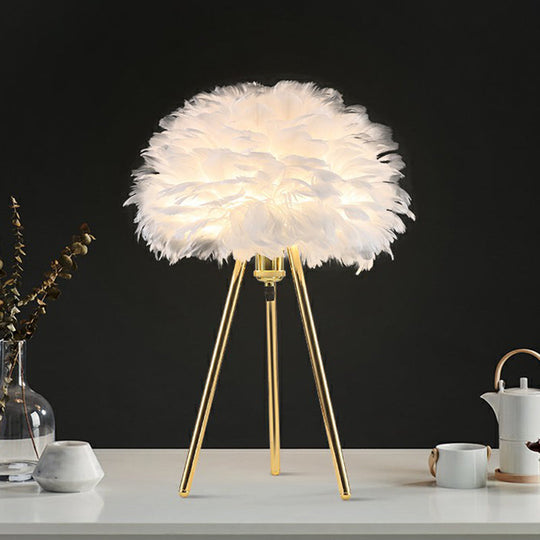 Minimalistic Metallic Tripod Table Light with Feather Shade in Gold