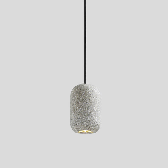 Sleek Single Pendant Light: Geometric Cement Ceiling Fixture for Modern Restaurants