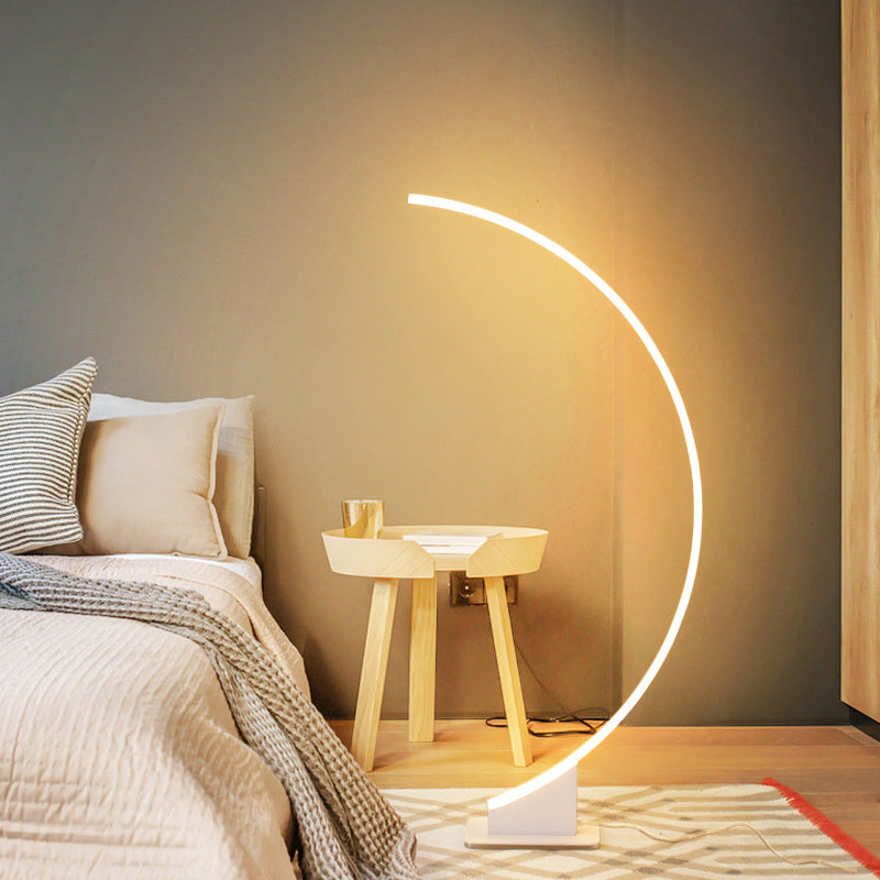 Arched Shape LED Floor Lamp in White for a Simplistic Metallic Living Room Look