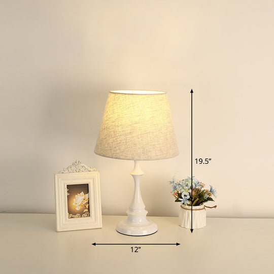 Iron Nightstand Lamp: Minimalistic 1-Light Bedside Table Light with Tapered Fabric Shade