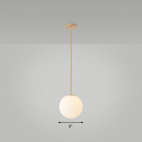Sleek White Glass Pendant Light for Minimalist Table Settings