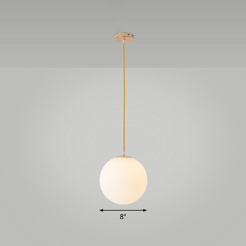 Sleek White Glass Pendant Light for Minimalist Table Settings