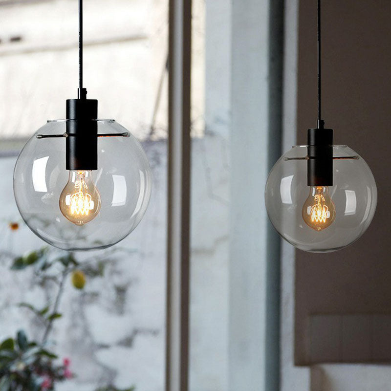 Minimalistic 1-Light Black Pendant Light Fixture - Clear Glass Globe Design for Restaurants