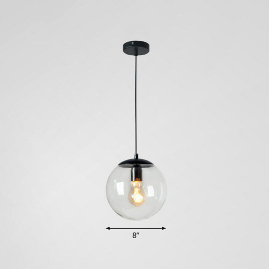 Minimalistic 1-Light Black Pendant Light Fixture - Clear Glass Globe Design for Restaurants