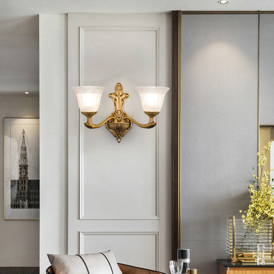 Traditional Bell Wall Sconce with Brass Finish and White Ribbed Glass